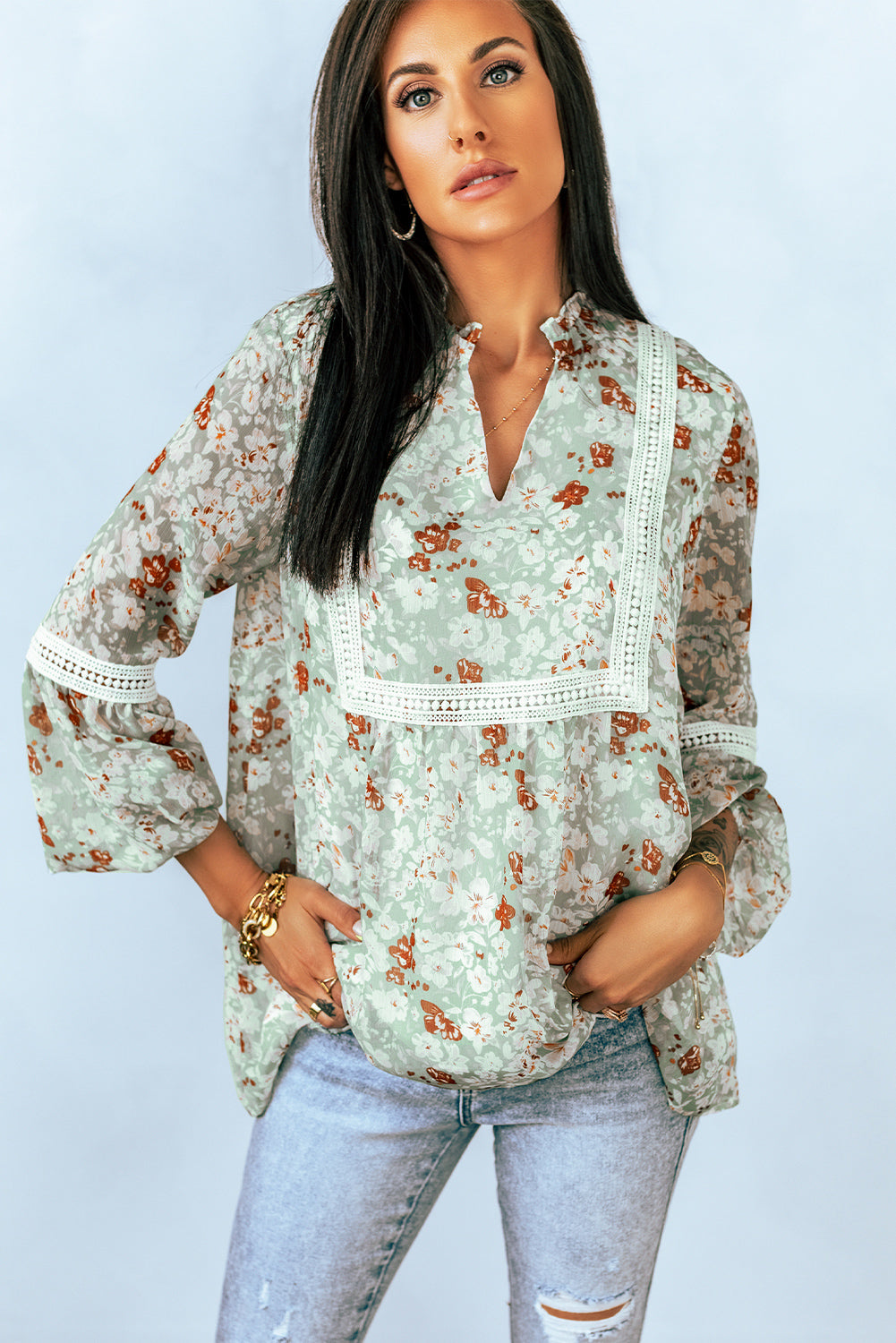 Blusa con ribete de encaje floral